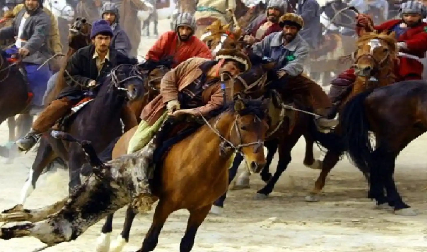 Buzkashi riders competing on horseback
